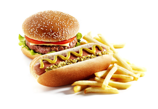 delicious burger and hot dog with fried potatoes isolated