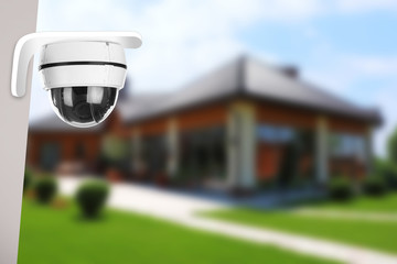 Home security system. House under CCTV camera surveillance