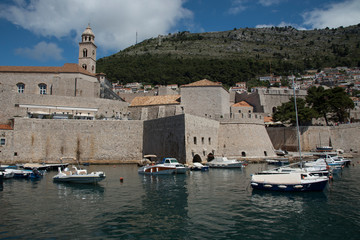 Fototapeta na wymiar Views from the sea of the city of Dubrovnik in Croatia, Europe. Beautiful view of the Dalmatian coast from the Adriatic Sea.