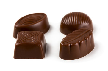Chocolate pralines isolated on white background