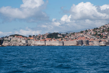 Fototapeta premium Views from the sea of the city of Dubrovnik in Croatia, Europe. Beautiful view of the Dalmatian coast from the Adriatic Sea.