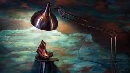 women shoes and lamp sconce inside interior dresser wall. brown women's shoes. Moscow