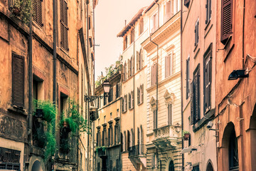Fototapeta na wymiar Residential houses of Rome. Old town buildings. Street view. Rome, Italy