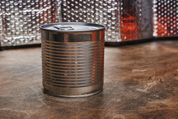 tin can on wooden background isolated