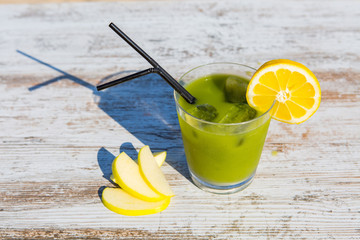 Green Smoothie with sea in background