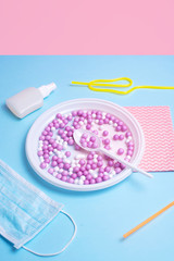 Still life: disposable tableware and items to protect against viruses.