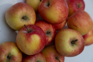 Lots of red and yellow apples