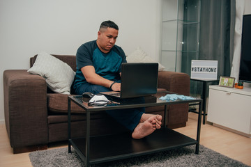 man working online during quarantine.