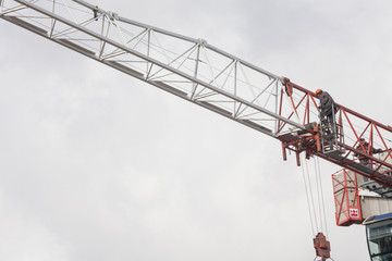construction crane on a gray sky