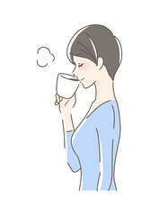 マグカップのコーヒーを飲む女性の横顔