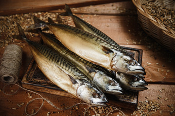 view of smoked fish on wooden surface delicious
