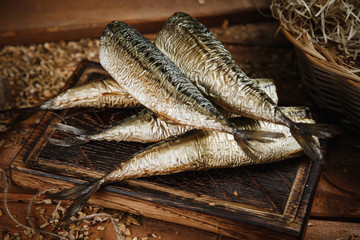 view of smoked fish on wooden surface delicious