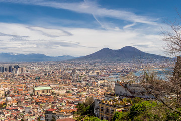 Aerial view of the city center of Naples with Mount Vesuvius on background. The bay of Naples, Italy