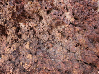 Laterite stone background, rock brown texture