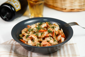 portion of boiled prawns with herbs served on table delicious