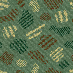 Spotted Camouflage Jeans background. Denim seamless pattern. Green jeans cloth.
