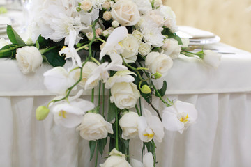 Wedding banquet table with flowers decoration