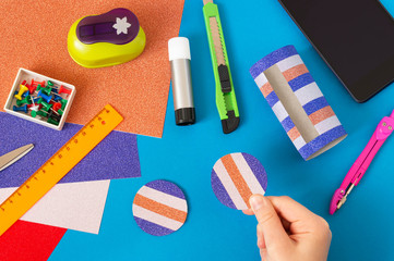 Child makes stand for smartphone. Step 10