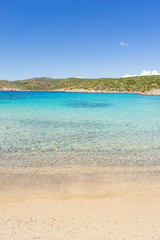 Fototapeta na wymiar Beautiful sandy beach and crystal clear water at Agia Dynami beach on Chios island, Greece.
