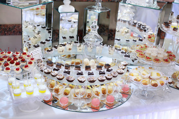 Delicious wedding reception candy bar dessert table