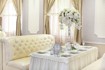 luxury wedding decorations with bench, candle and flowers composition on ceremony place