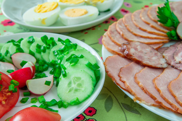 platter with cold cuts and vegetables