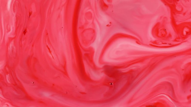 Abstract Colorful Paint Ink Explode Diffusion Psychedelic Blast Movement. soft colors, abstract composition. Acrylic texture with red marbling background 
