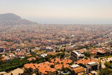 Fototapeta na wymiar City view on the Mediterranean coast. Summer, noon, heat, sunny.
