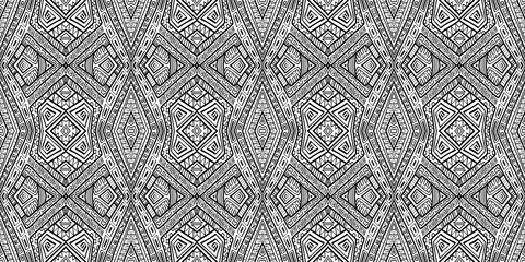 Ethnic pattern. Tribal background. Native ornament. Aztec. Fabric patterm. Boho. Bohemian style. Black and white texture. Print for fashion textile or interior fabric.