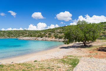 Fototapeta na wymiar The beautiful Agia Dynami beach on a bright sunny day.