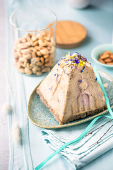 Healthy Vegan Orthodox Easter Cake Made of Cashews, walnuts, Coconut milk and Dried Fruits