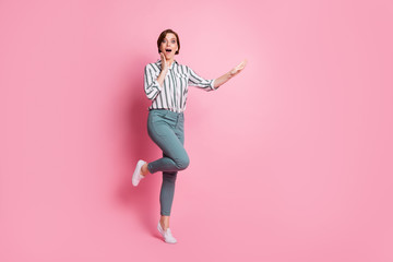 Full length photo of funny astonished girl look incredible bargains show hands copy space palm scream impressed wear modern outfit isolated over pink color background