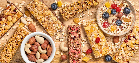 Cereal healthy snack. Granola bar with nuts and dry fruit berries. Diet food. Protein muesli bars...