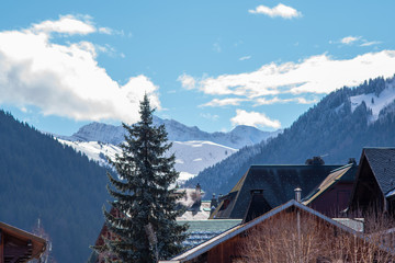 mountains and cabins in morzine fance - obrazy, fototapety, plakaty