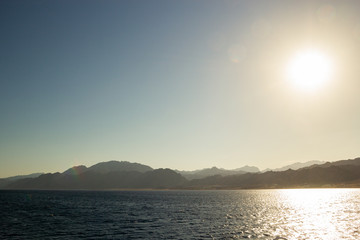 Egyptian mountains view from the red sea. landscape of mountains at sunset