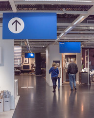 Back view Caucasian customers shopping at furniture and home furnishing store in Dallas, Texas, USA