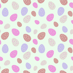Pink, brown and violet easter eggs with dots on pastel green background seamless pattern.