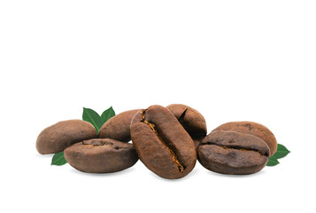 Close-up brown roasted coffee beans with leaves isolated on white background