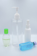 Alcohol gel and sanitizer hand gel cleaners for anti Bacteria and virus on White Background, People using alcohol gel to wash hands to prevent COVID-19 virus