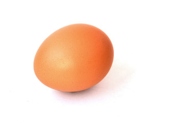 Inshell orange egg on a white background. Isolate food