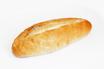 fresh loaf of yeast bread on a white background