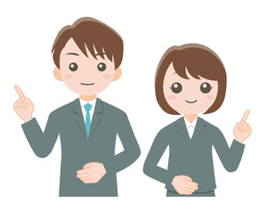 スーツ姿の男女が案内している 