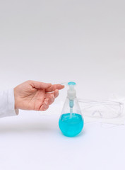 women washing hands gel soap sanitizer background infections coronavirus covid 19 dispenser white blue