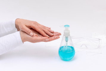 women washing hands gel soap sanitizer background infections coronavirus covid 19 dispenser white blue