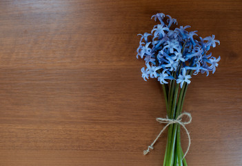 Bouquet hyacinth on wooden background