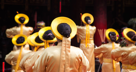 Asian civilian artists performing spiritual activities to express the respect to Buddhist and...