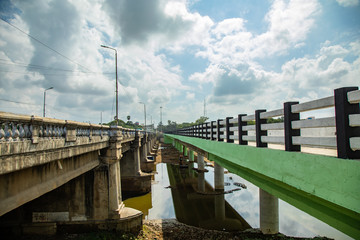 Fototapeta premium Aerial top view Sunset river bridge
