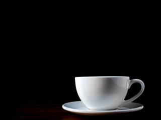 white coffee cup on black background