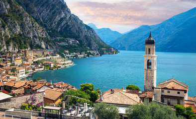 Naklejka na ściany i meble Scenic view on Lake Garda in Limone sul Garda town, famous tourist destination in Italy