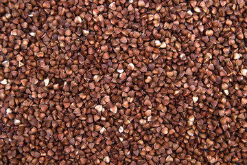Buckwheat. Texture. Background. Good nutrition. Healthy eating. Diet. Vertical photo.